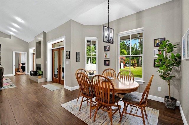 459 Oakwood Trl, Crawfordville, FL 32327 - dining space with dark wood-type flooring and lofted ceiling