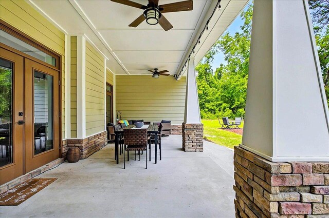459 Oakwood Trl, Crawfordville, FL 32327 - view of patio featuring ceiling fan, outdoor dining space, and french doors
