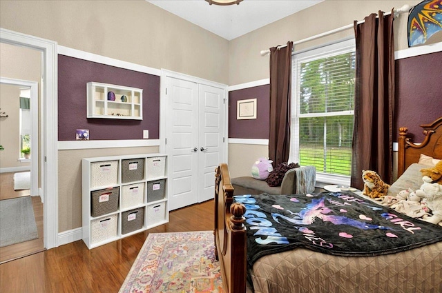 459 Oakwood Trl, Crawfordville, FL 32327 - bedroom featuring multiple windows and wood finished floors