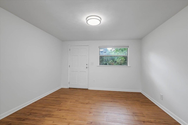 2014 Coffee Ln, Tallahassee, FL 32303 - empty room with wood finished floors and baseboards