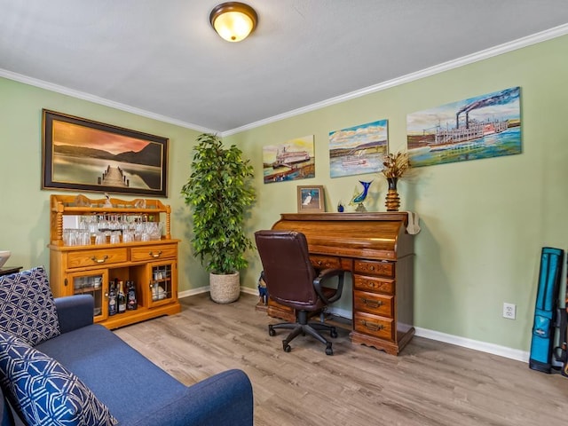 office with wood-type flooring and crown molding