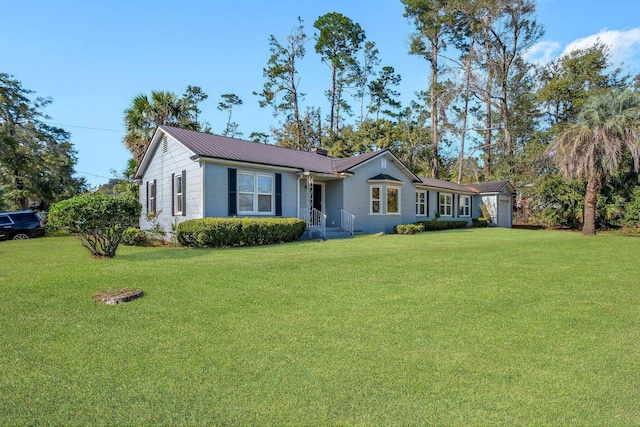 ranch-style home with a front lawn