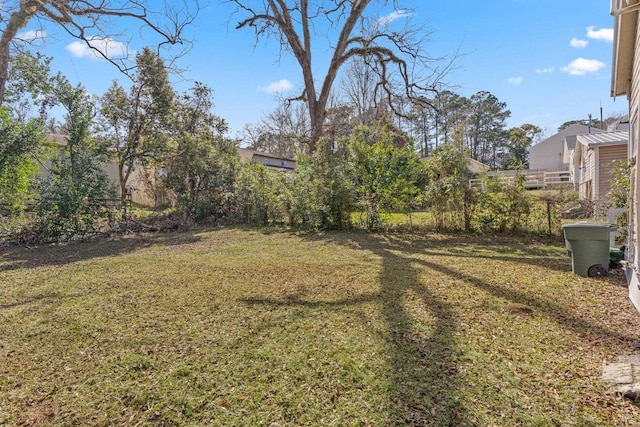 view of yard with fence