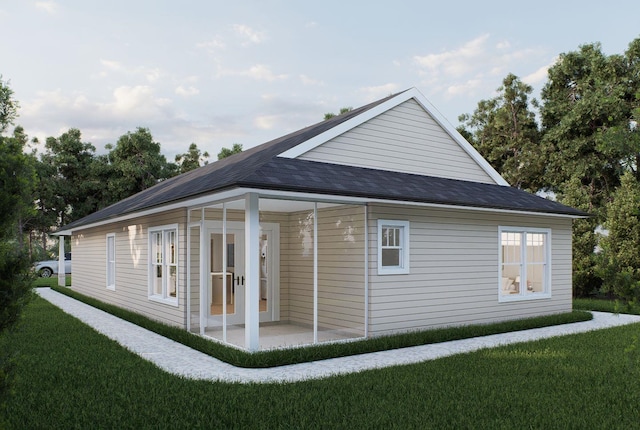606 Hampton Ave, Tallahassee, FL 32310 - view of property exterior featuring a lawn