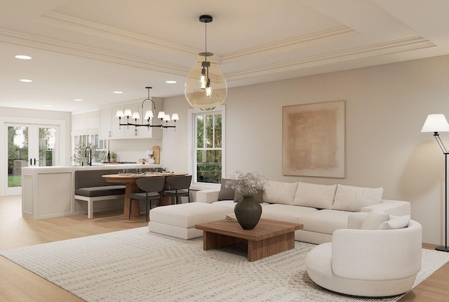 606 Hampton Ave, Tallahassee, FL 32310 - living area featuring ornamental molding, a tray ceiling, and light wood finished floors