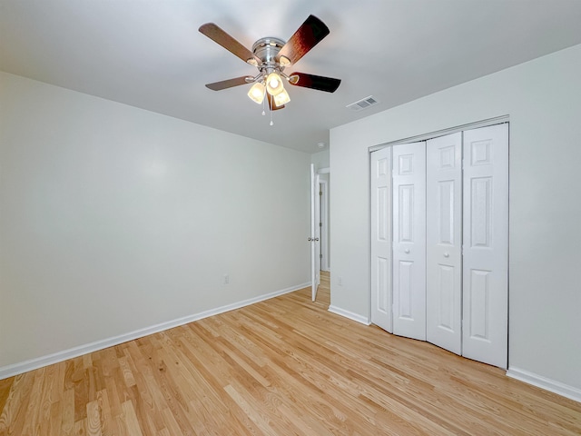 804 Medical Commons Ct, Tallahassee, FL 32310 - unfurnished bedroom with baseboards, ceiling fan, light wood-style flooring, visible vents, and a closet