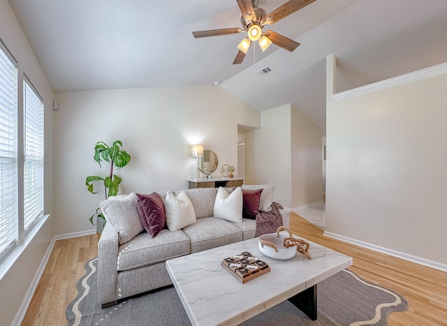 804 Medical Commons Ct, Tallahassee, FL 32310 - living room with lofted ceiling, baseboards, light wood finished floors, visible vents, and a ceiling fan