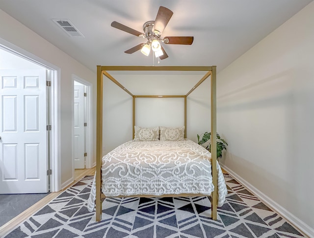 804 Medical Commons Ct, Tallahassee, FL 32310 - bedroom with baseboards, visible vents, and ceiling fan