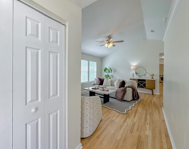 804 Medical Commons Ct, Tallahassee, FL 32310 - living room with a ceiling fan, light wood-style flooring, baseboards, and lofted ceiling