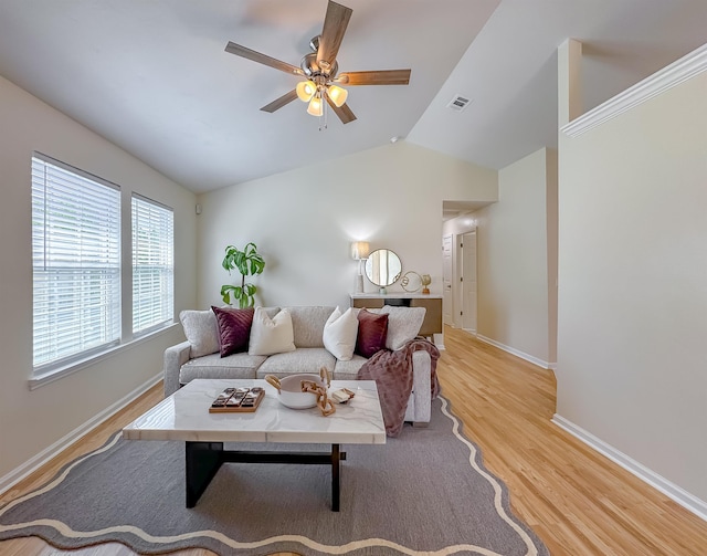 804 Medical Commons Ct, Tallahassee, FL 32310 - living room featuring baseboards, wood finished floors, vaulted ceiling, and a ceiling fan