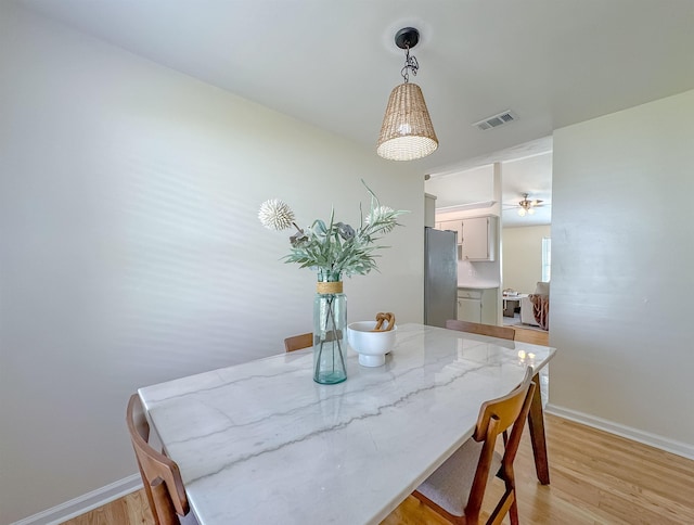 804 Medical Commons Ct, Tallahassee, FL 32310 - dining space with baseboards, visible vents, and light wood-style flooring