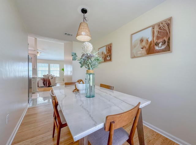 804 Medical Commons Ct, Tallahassee, FL 32310 - dining space with baseboards, light wood-style flooring, and visible vents
