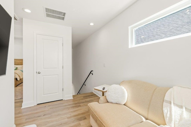 8372 Bull Headley Rd, Tallahassee, FL 32312 - living area with light wood finished floors, an upstairs landing, and recessed lighting