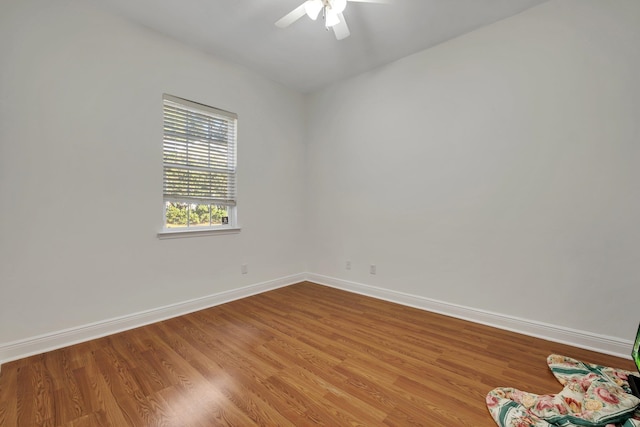 spare room featuring light hardwood / wood-style floors and ceiling fan