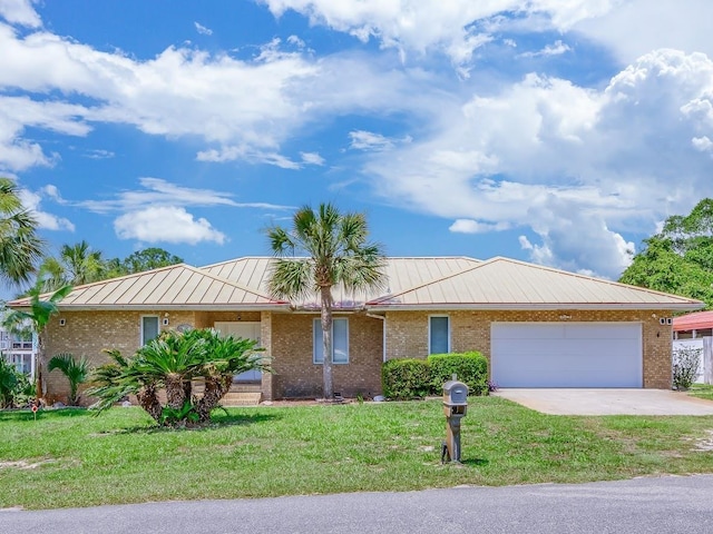 single story home featuring a front lawn and a garage