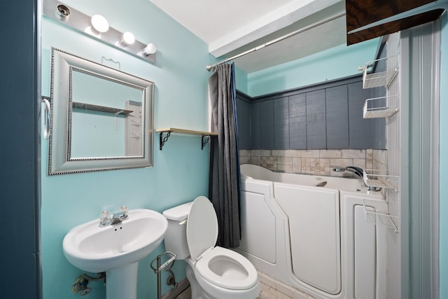 2401 Hideaway Ct, Tallahassee, FL 32303 - bathroom with a bath, toilet, and a sink