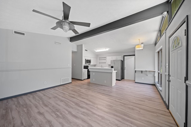 2401 Hideaway Ct, Tallahassee, FL 32303 - unfurnished living room with lofted ceiling with beams, a ceiling fan, light wood-style floors, and visible vents
