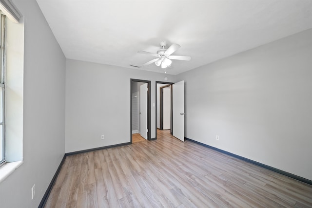 2401 Hideaway Ct, Tallahassee, FL 32303 - spare room featuring ceiling fan, baseboards, and light wood-style flooring