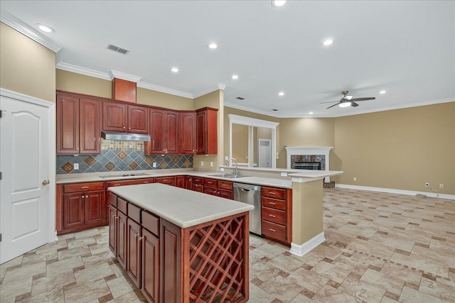 5127 Wild Rose Way, Tallahassee, FL 32312 - kitchen with stainless steel dishwasher, a ceiling fan, light countertops, a kitchen island, and black electric stovetop