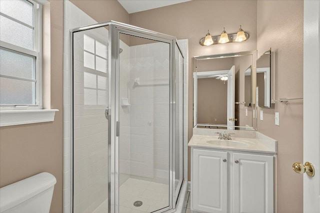 5127 Wild Rose Way, Tallahassee, FL 32312 - full bathroom with vanity, a shower stall, and ceiling fan