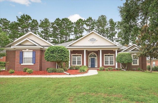 5127 Wild Rose Way, Tallahassee, FL 32312 - neoclassical / greek revival house with a front lawn and brick siding
