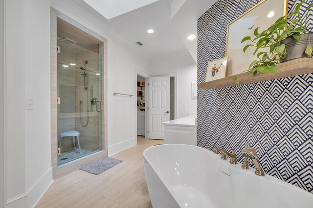 8555 Congressional Dr, Tallahassee, FL 32312 - full bath with a shower stall, a soaking tub, baseboards, crown molding, and recessed lighting