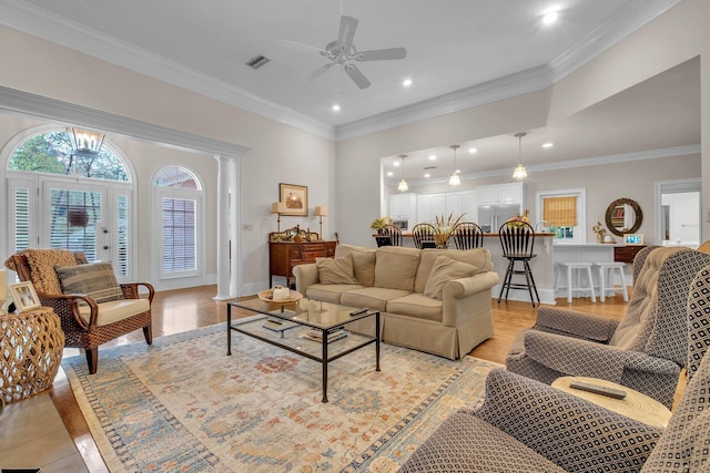 8555 Congressional Dr, Tallahassee, FL 32312 - living area featuring ceiling fan, recessed lighting, light wood-style floors, crown molding, and baseboards