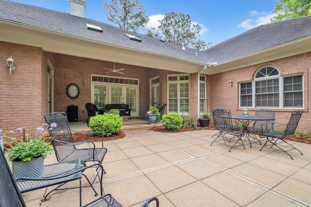 8555 Congressional Dr, Tallahassee, FL 32312 - view of patio with ceiling fan, outdoor dining area, and french doors