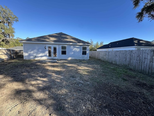 back of property featuring french doors