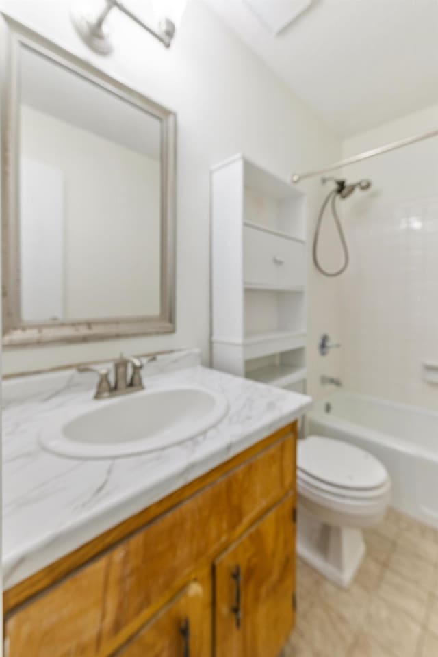 full bathroom featuring vanity, toilet, and bathtub / shower combination