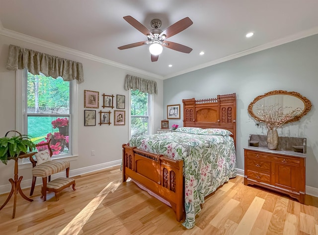 bedroom with baseboards, recessed lighting, light wood-type flooring, and crown molding
