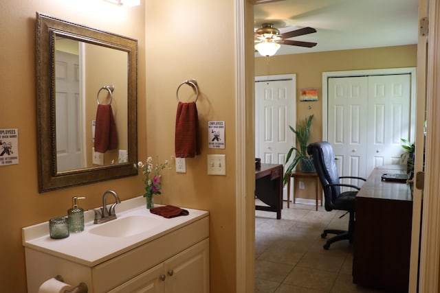 bathroom featuring vanity, tile patterned floors, and ceiling fan