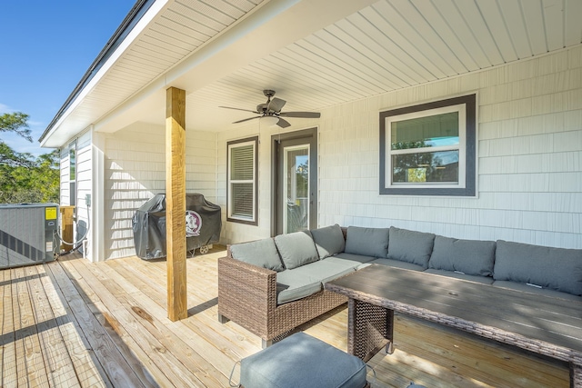 wooden deck featuring a grill, an outdoor hangout area, central AC, and ceiling fan