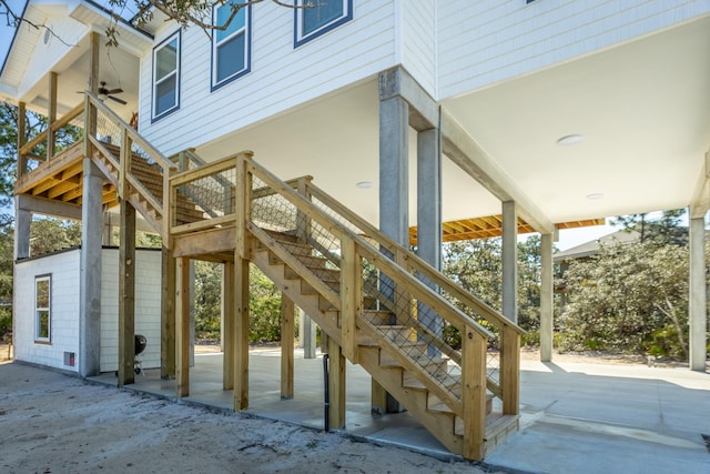 exterior space featuring ceiling fan and a patio area