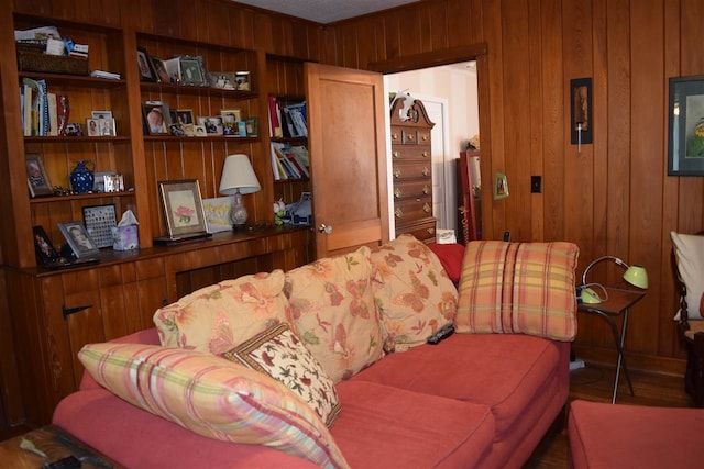 living room with wooden walls