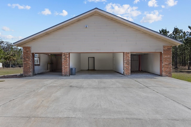 garage featuring a carport