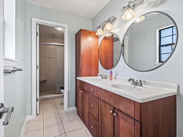 bathroom featuring toilet, vanity, tile patterned floors, and walk in shower