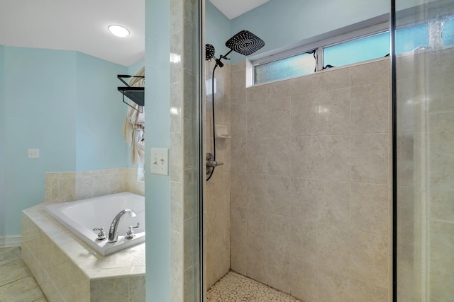 bathroom with shower with separate bathtub