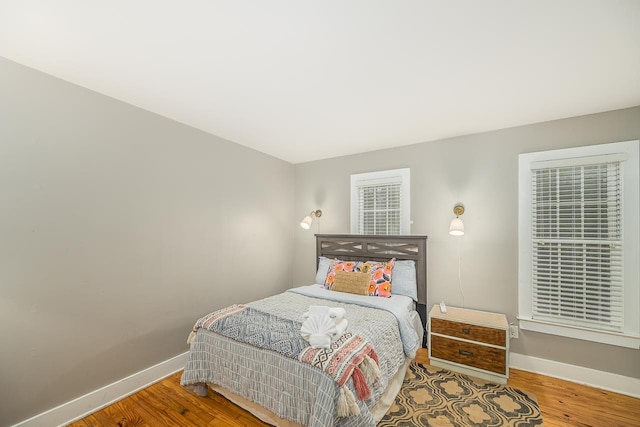 3206 Old Bainbridge Rd, Tallahassee, FL 32303 - bedroom featuring wood finished floors and baseboards