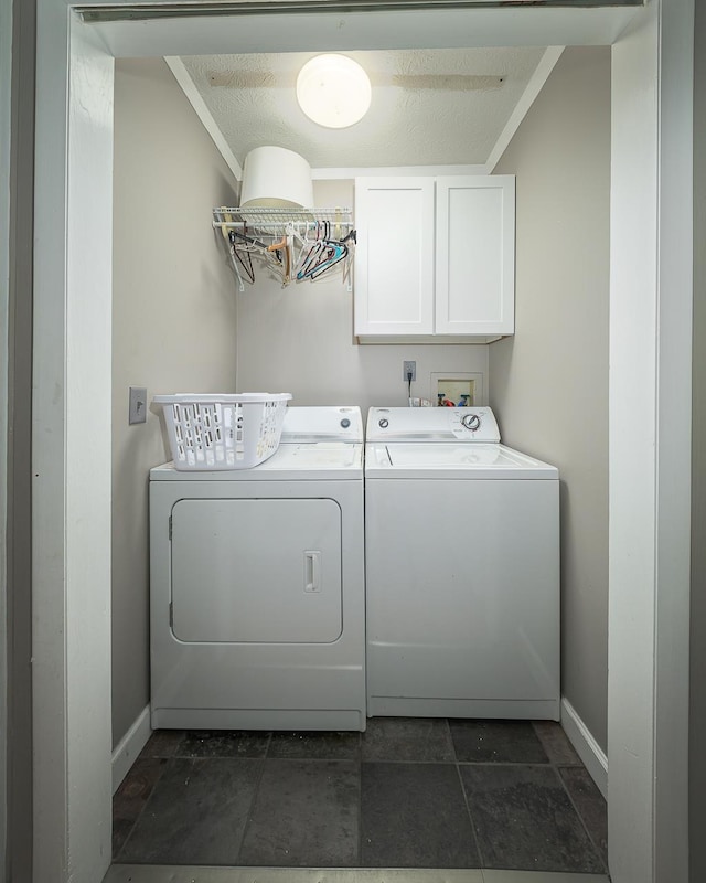 3206 Old Bainbridge Rd, Tallahassee, FL 32303 - laundry room with washing machine and dryer, cabinet space, and baseboards