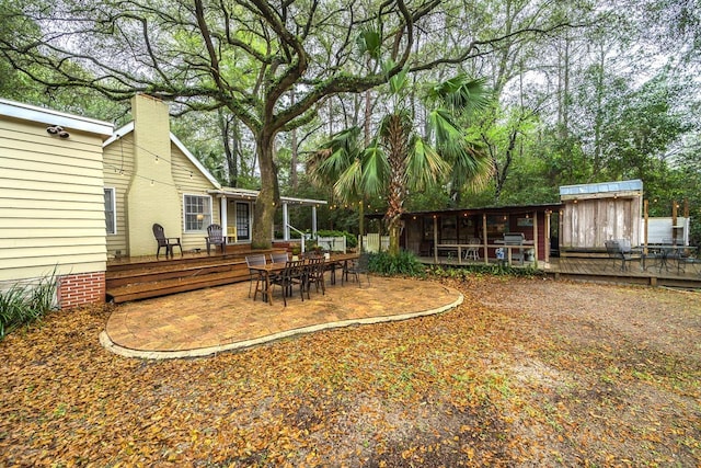 3206 Old Bainbridge Rd, Tallahassee, FL 32303 - view of yard with a deck