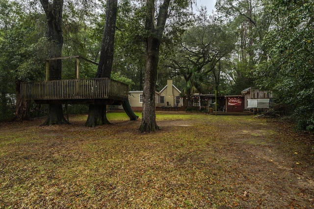 3206 Old Bainbridge Rd, Tallahassee, FL 32303 - view of yard with a deck