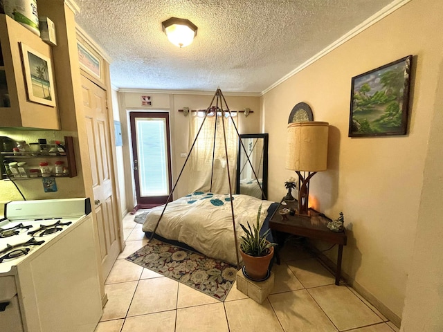 bedroom featuring light tile patterned floors, a textured ceiling, and ornamental molding