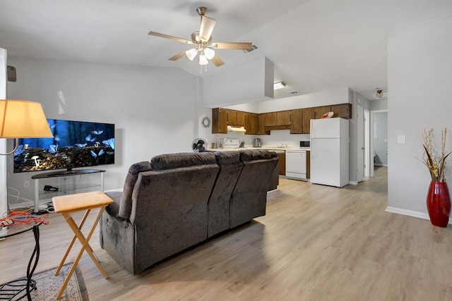 living room with light hardwood / wood-style floors, ceiling fan, and vaulted ceiling