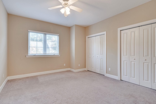 3283 Gramercy Pl, Tallahassee, FL 32308 - unfurnished bedroom with two closets, carpet flooring, and ceiling fan