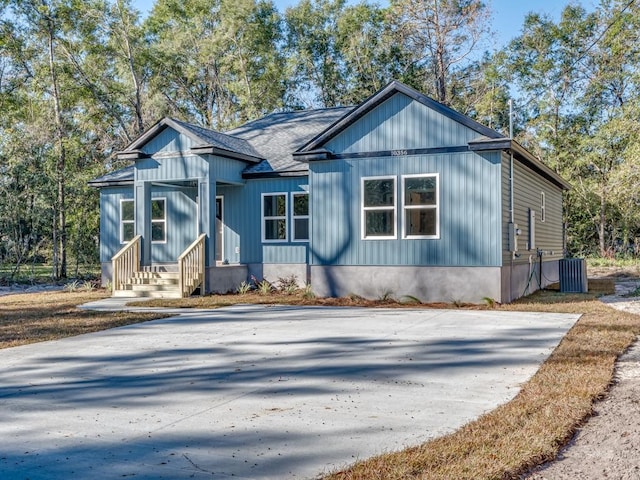 bungalow-style home featuring central AC