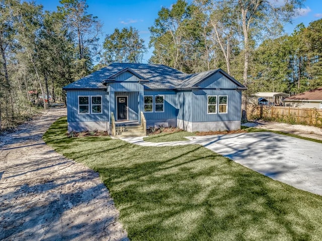 view of front of home with a front yard