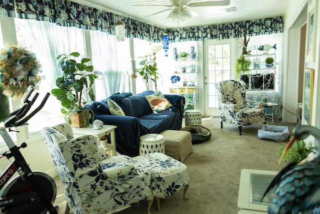 sunroom / solarium with ceiling fan