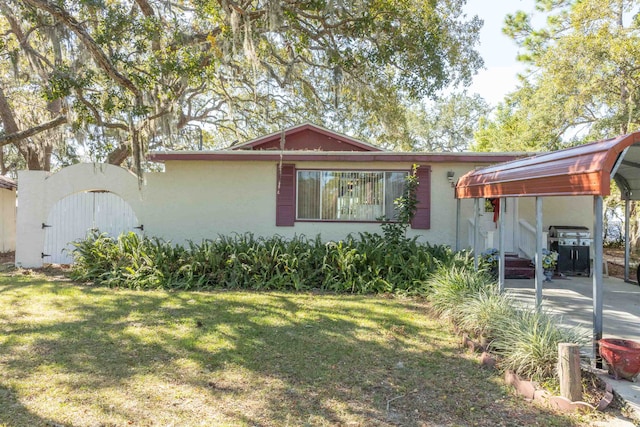 view of front of home with a front yard