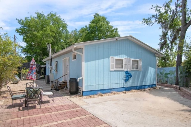 1405 SE 2nd Ave, Steinhatchee, FL 32359 - rear view of house featuring a patio area and outdoor dining space